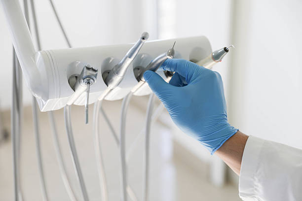 Professional Tooth Extraction technician working in Earlysville, VA